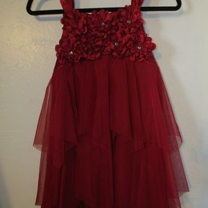 Two matching red dresses